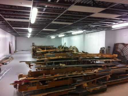 All the t-bars for the ceiling completed prior to move-in from Hanna Avenue. Sections of the old layout piled in the center of the room during the move-in.